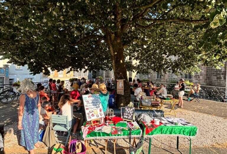 Solidarity stand at a gathering in Brittany, at the heart of a mobilisation of volunteers and supporters.